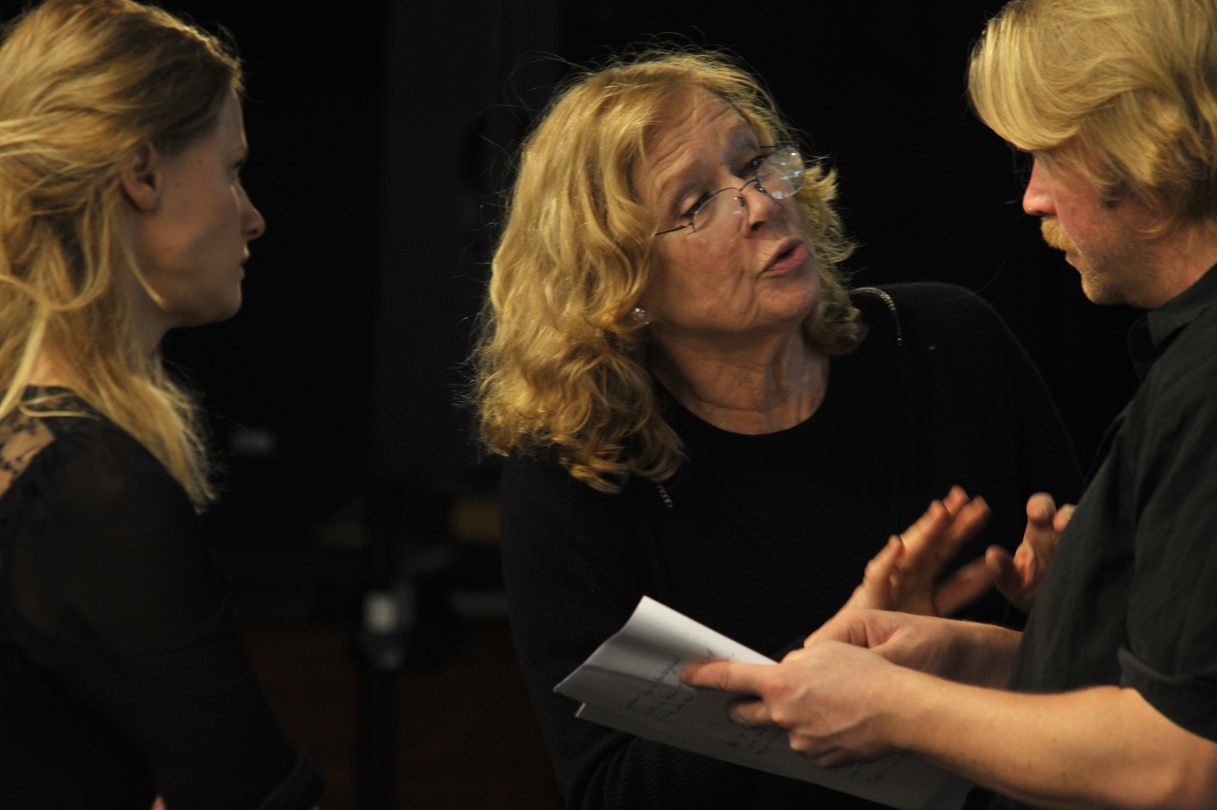 Liv Ullmann discussing with two actors